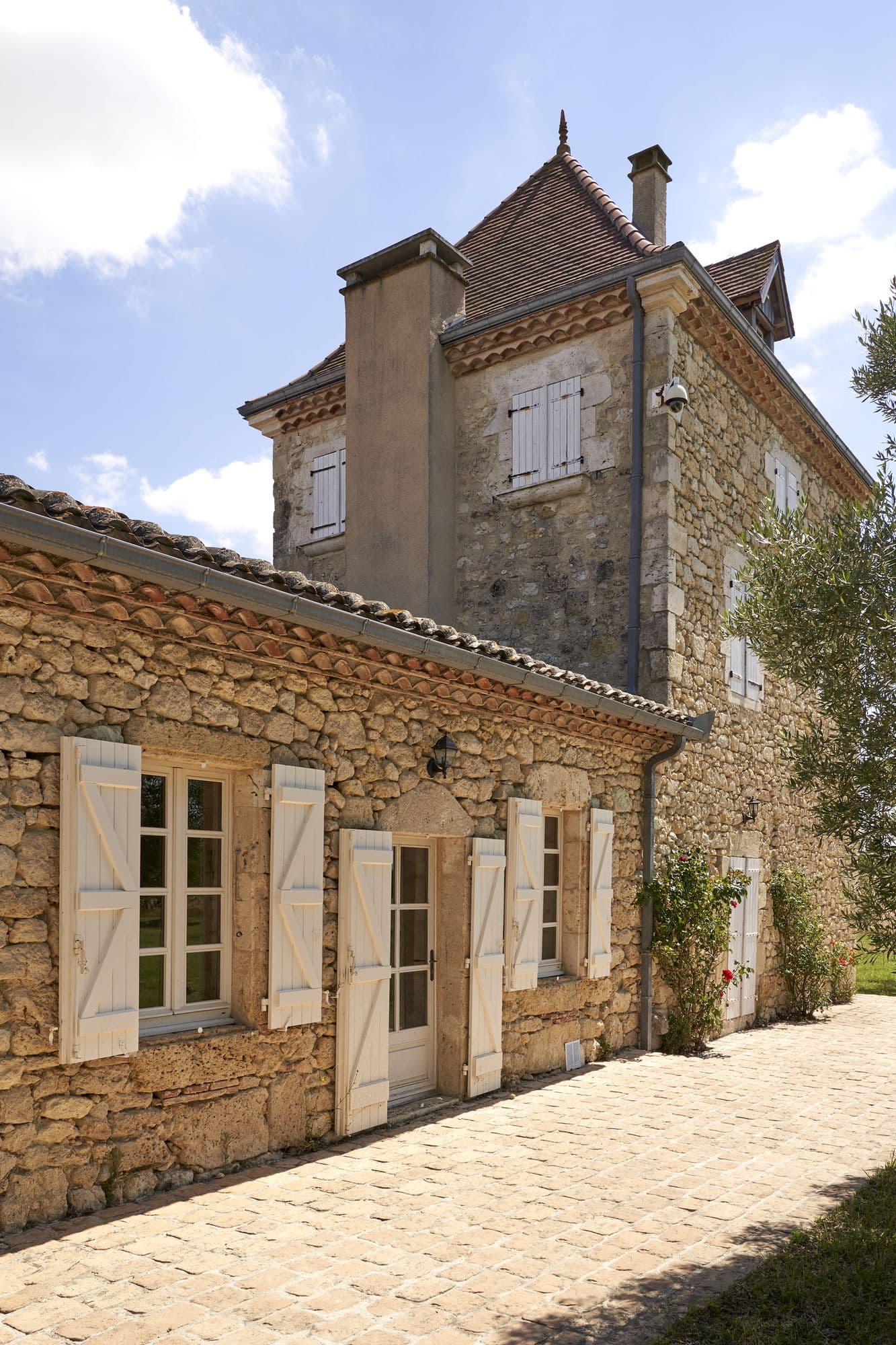 The entrance porch running along the front of the house
